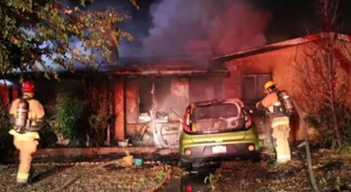 Stolen car crashes into home, traps family in fire