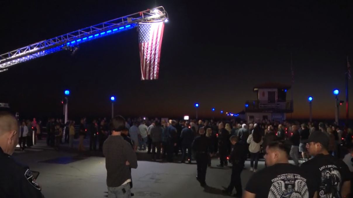 A candlelight vigil was held on Oct. 6, 2023 to honor Manhattan Beach motorcycle officer Chad Swanson who was killed in a multi-vehicle crash on the 405 Freeway in Carson. (KTLA)