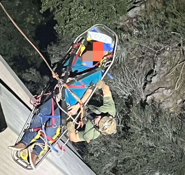 A trapped driver was rescued by crews after crashing off the side of a bridge in the Angeles National Forest on Oct. 6, 2023. (LASD Special Enforcement Bureau)