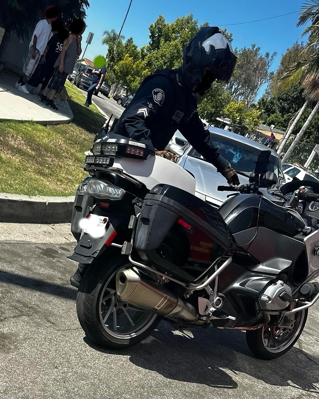 Photos shared by the Los Angeles County Sheriff's Department show the arrest of a person accused of impersonating an officer and conducting illegal stops. (LASD)