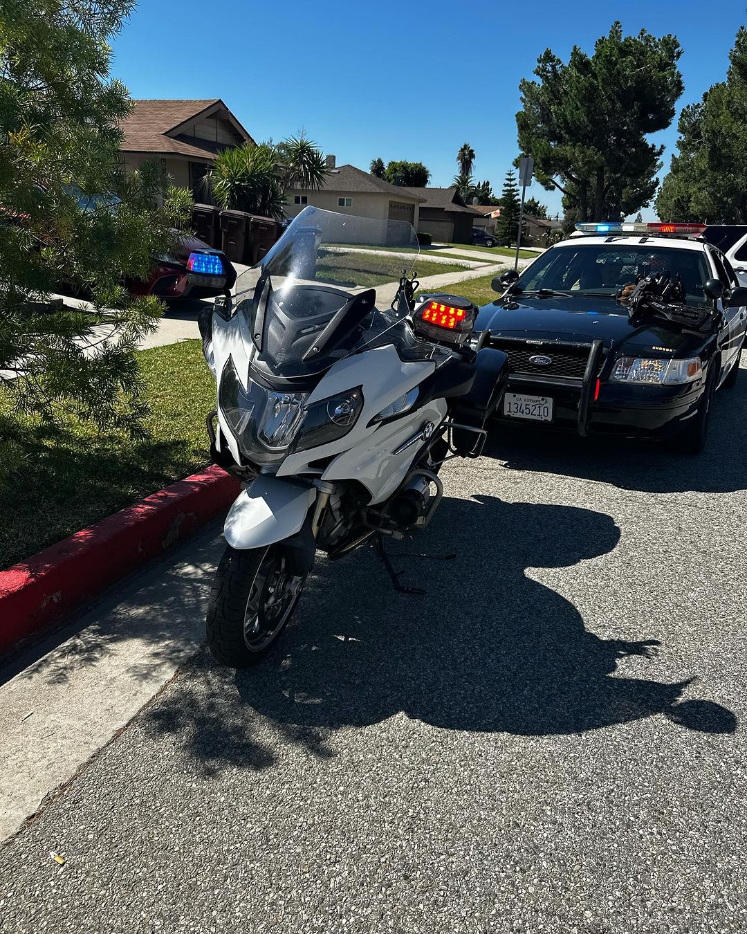 Photos shared by the Los Angeles County Sheriff's Department show the arrest of a person accused of impersonating an officer and conducting illegal stops. (LASD)