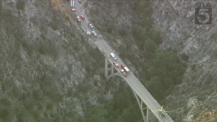 A trapped driver was rescued by crews after crashing off the side of a bridge in the Angeles National Forest on Oct. 6, 2023. (KTLA)