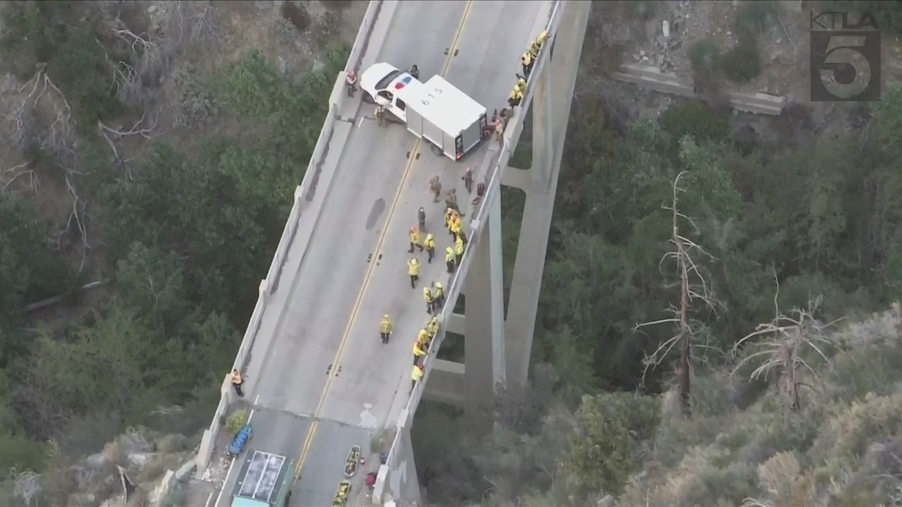 A trapped driver was rescued by crews after crashing off the side of a bridge in the Angeles National Forest on Oct. 6, 2023. (KTLA)