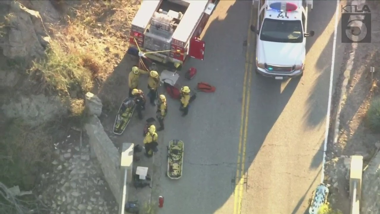 A trapped driver was rescued by crews after crashing off the side of a bridge in the Angeles National Forest on Oct. 6, 2023. (KTLA)