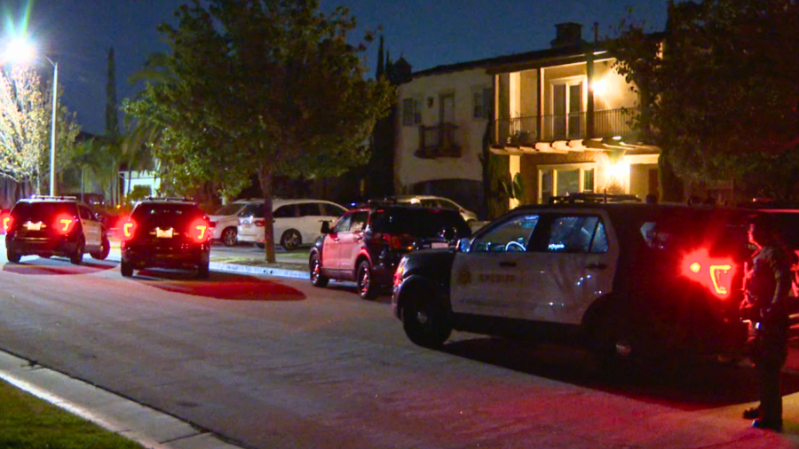 Authorities investigate a home-invasion robbery in Walnut.