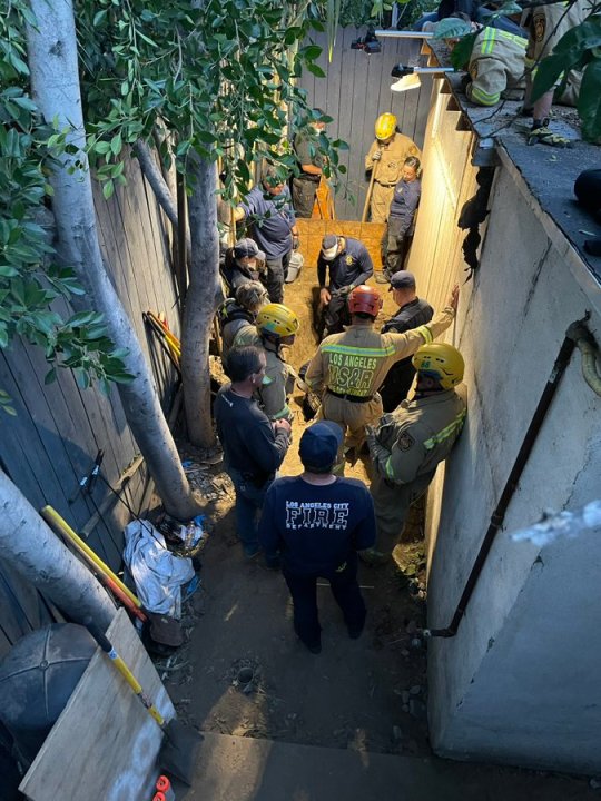 Homicide detectives and L.A. city fire crews at the crime scene on Community Court in North Hills, California. Nov. 21, 2023. (Los Angeles Police Department)