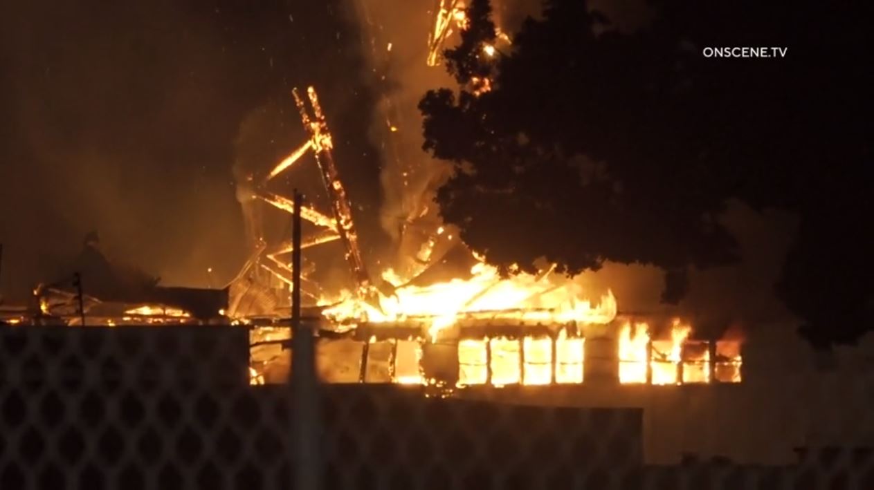 A second flare-up reignites at a historic WWII-era hangar in Tustin on Nov. 14, 2023. (OnScene.TV)