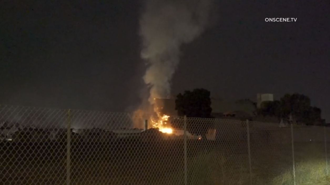 A second flare-up reignites at a historic WWII-era hangar in Tustin on Nov. 14, 2023. (OnScene.TV)