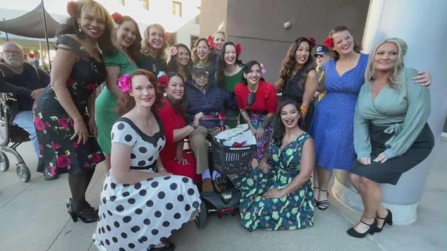 A group of female veterans with Pin-Ups for Vets, dressed up as WWII-style pin-up models while giving back to the community on Veteran’s Day on Nov. 11, 2023. (KTLA)