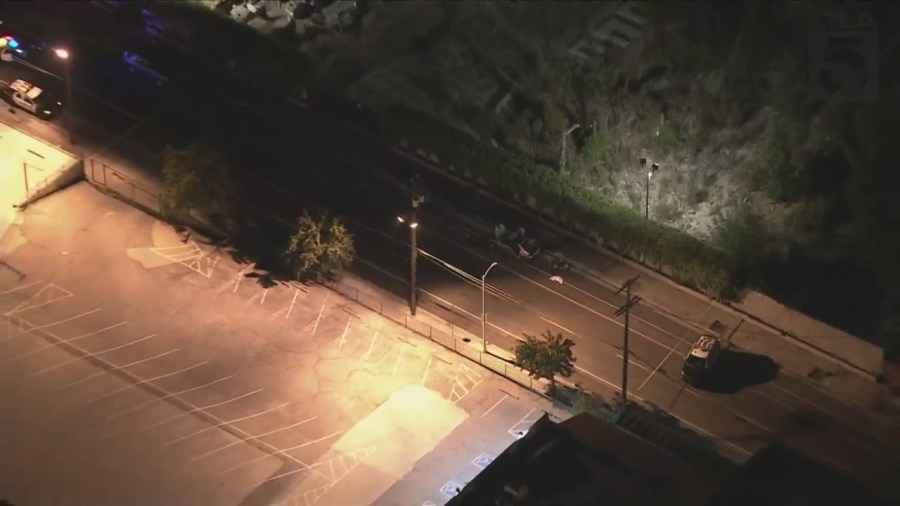 Police are investigating after a body was found inside a burning vehicle in Lincoln Heights on Nov. 9, 2023. (KTLA)