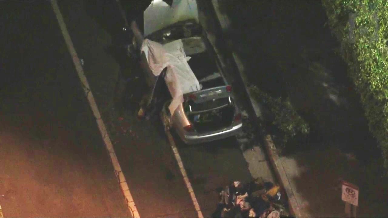 Police are investigating after a body was found inside a burning vehicle in Lincoln Heights on Nov. 9, 2023. (KTLA)