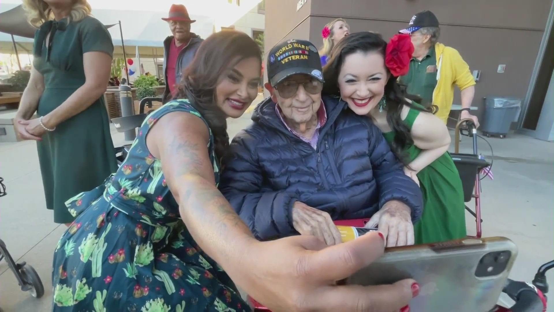 A group of female veterans with Pin-Ups for Vets, dressed up as WWII-style pin-up models while giving back to the community on Veteran’s Day on Nov. 11, 2023. (KTLA)