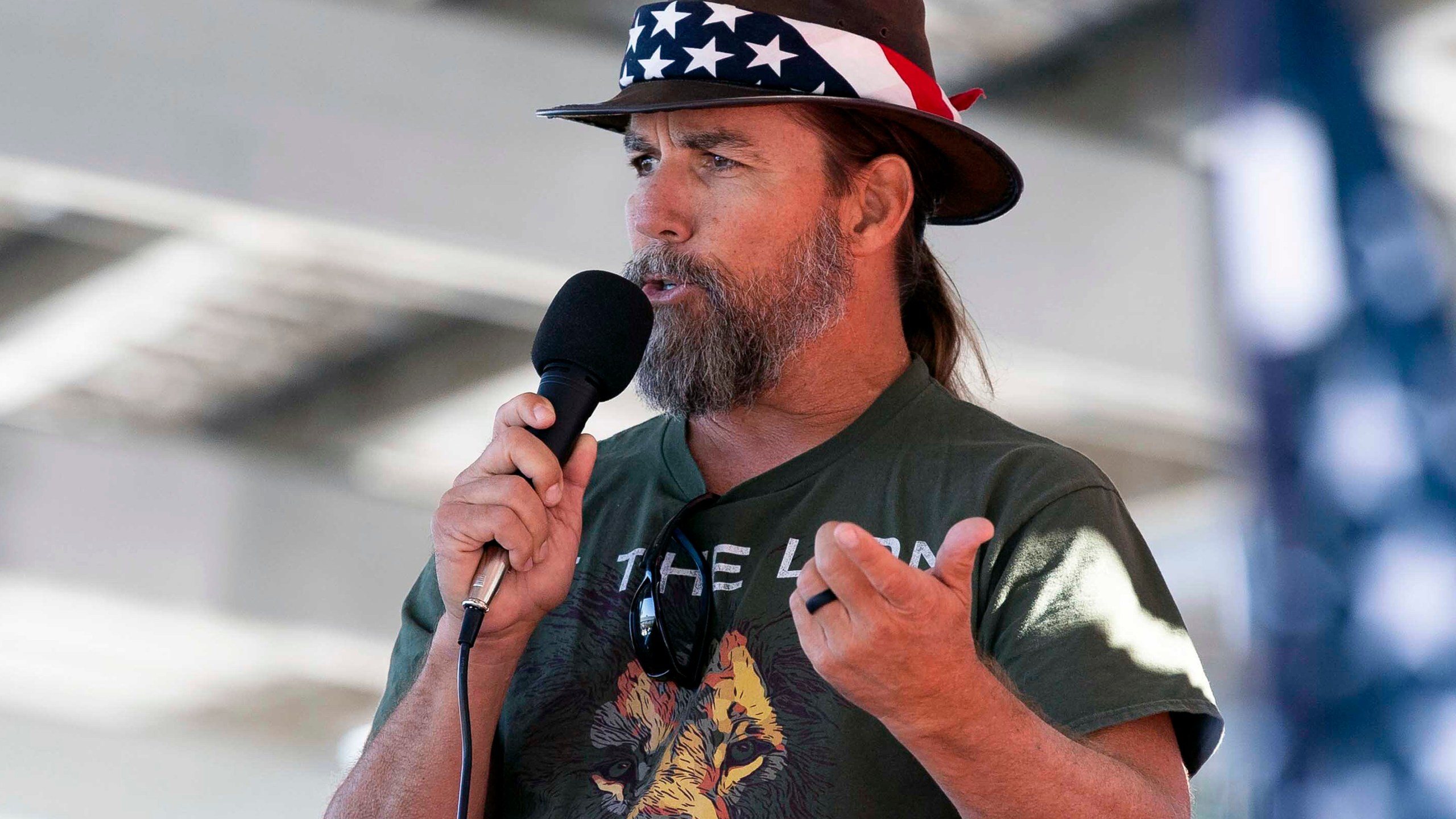 FILE - Alan Hostetter speaks during a pro-Trump election integrity rally he organized at the Orange County Registrar of Voters offices in Santa Ana, Calif., Nov. 9, 2020. Hostetter, a former California police chief convicted of a conspiracy charge in the U.S. Capitol riot was sentenced to more than 11 years in prison on Thursday, Dec. 7, 2023, after giving a speech that praised Republican presidential candidate Vivek Ramaswamy's suggestion the Jan. 6, 2021, attack could have been an "inside job." (Paul Bersebach/The Orange County Register via AP, File)