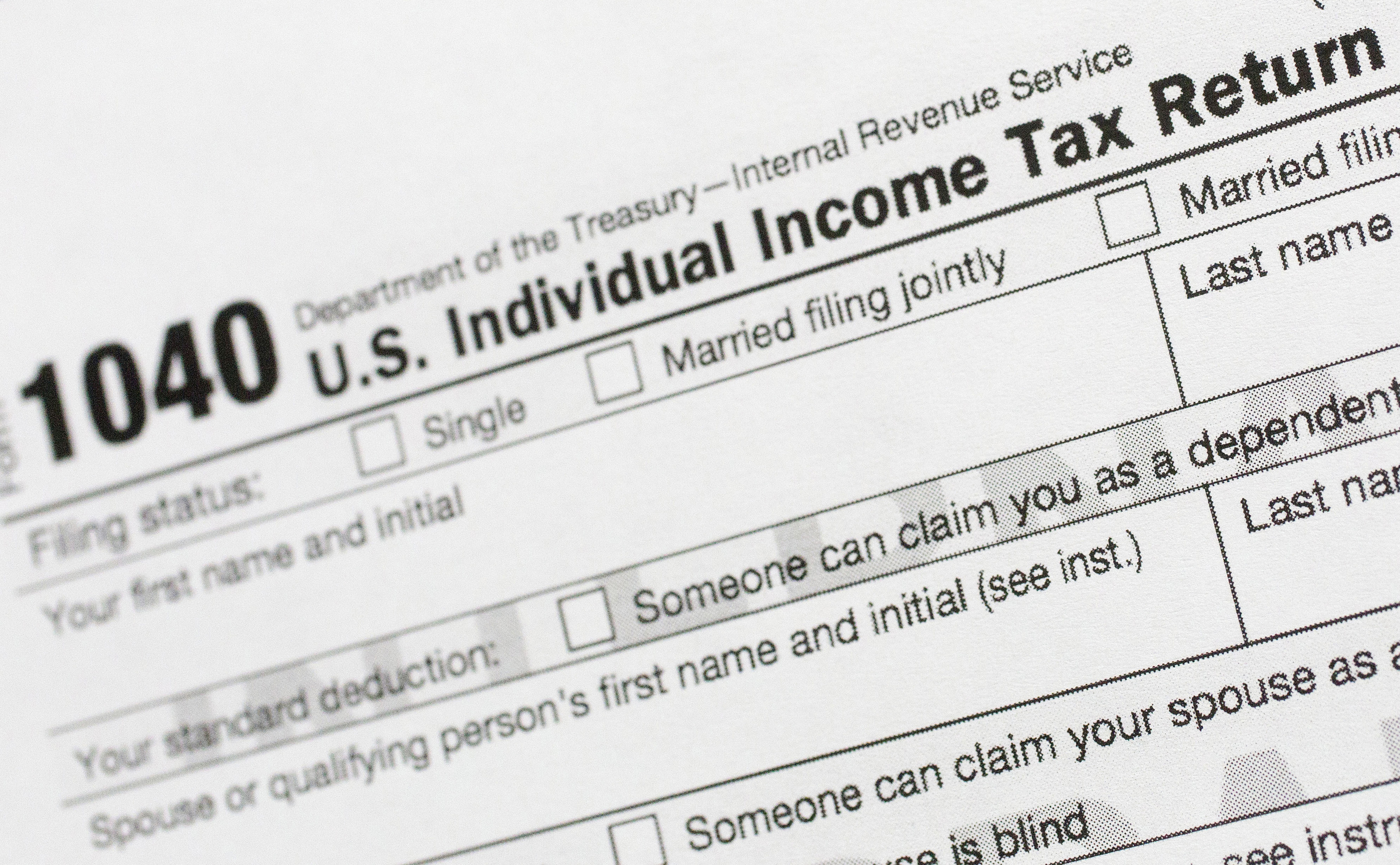 FILE - Part of a 1040 U.S. Individual Income Tax Return form is shown July 24, 2018, in New York. Only 11% of Americans itemize their taxes, which allows them to claim significant tax deductions for charitable donations. (AP Photo/Mark Lennihan, File)
