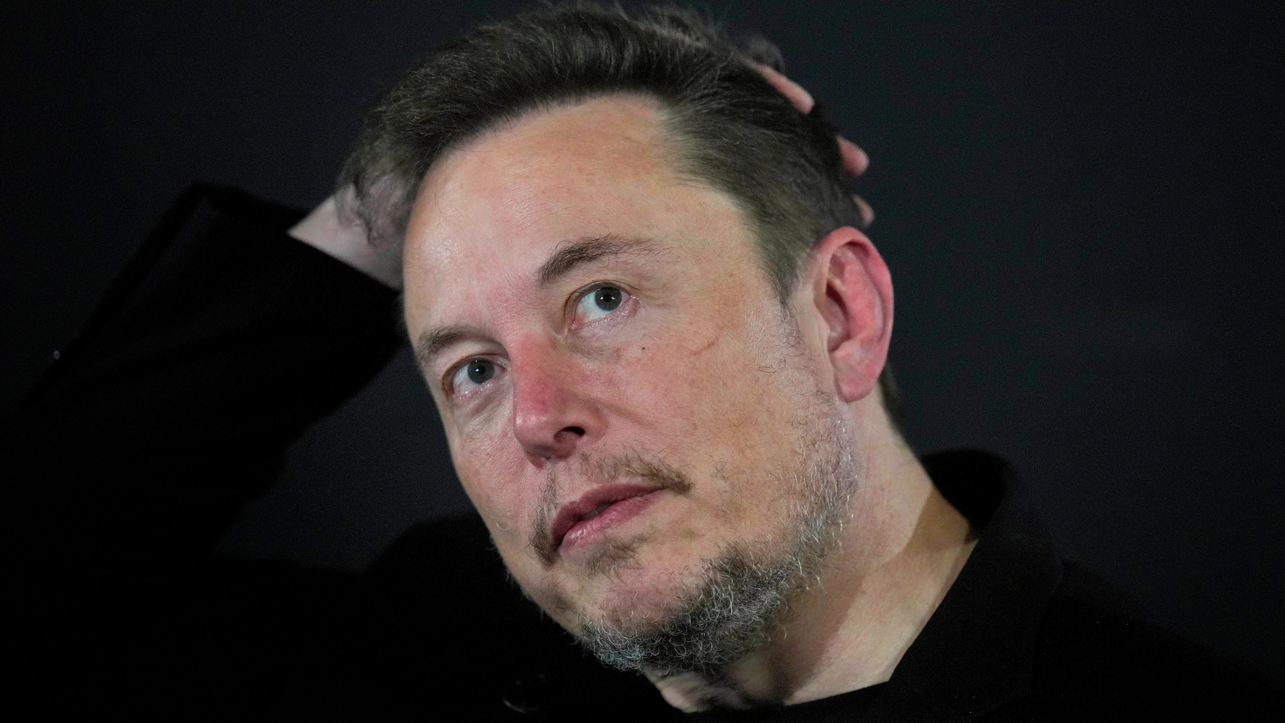 Elon Musk reacts during an in-conversation event with Britain's Prime Minister Rishi Sunak in London, on Nov. 2, 2023.