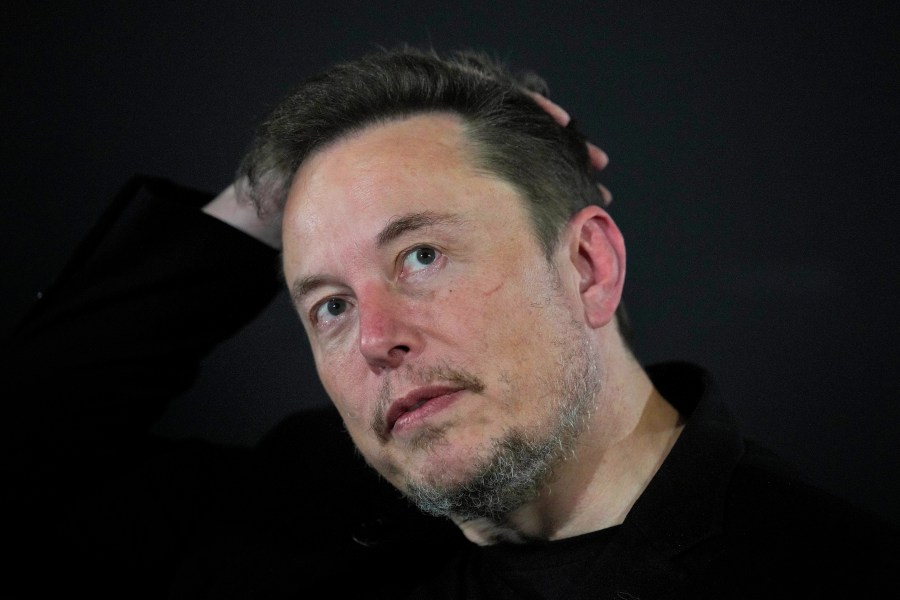 Elon Musk reacts during an in-conversation event with Britain's Prime Minister Rishi Sunak in London, on Nov. 2, 2023.