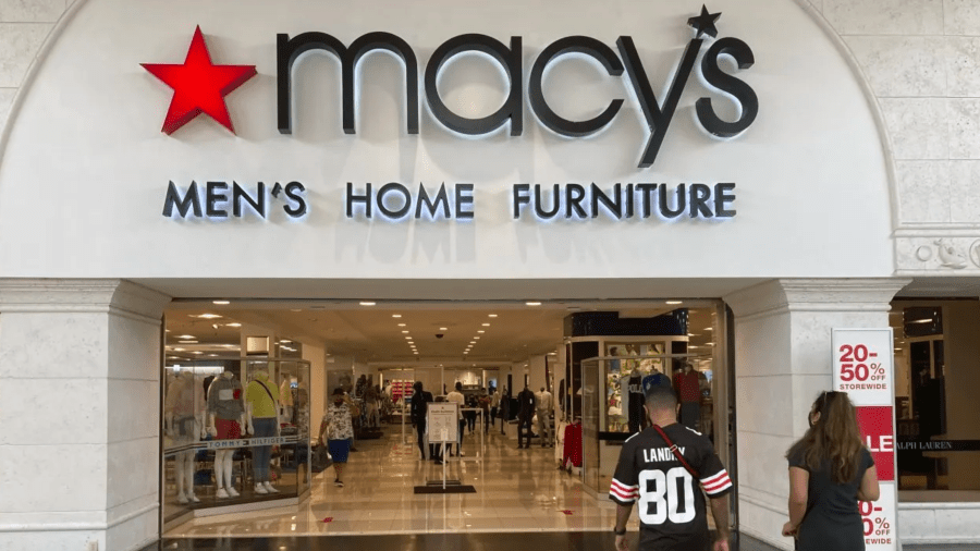 Shoppers are seen walking into a Macy's department store in this file photo.