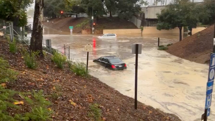 Vehicles are seen in flood waters near the 101 Freeway in Santa Barbara on Dec. 21, 2023.