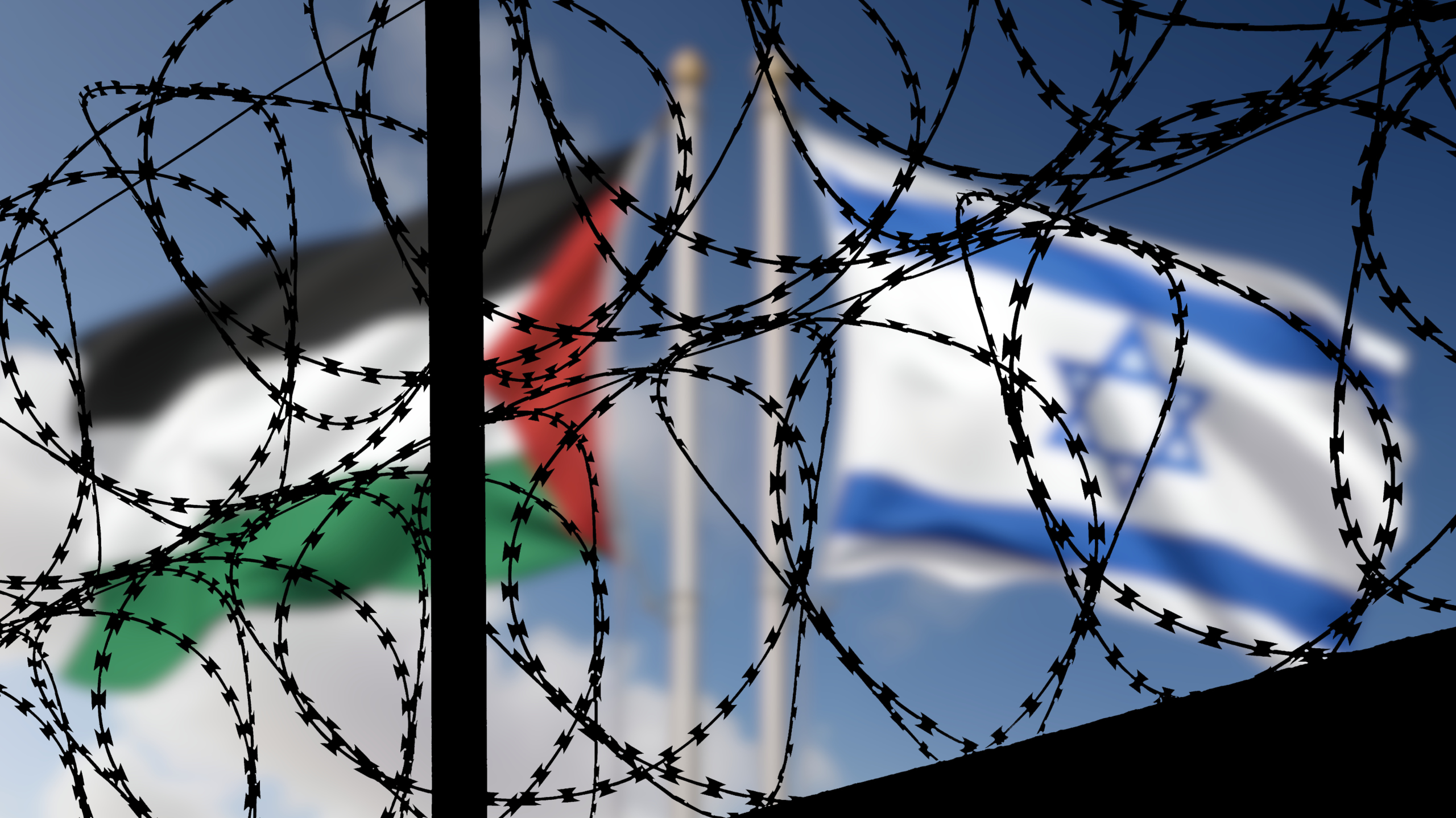 Flags of Israel and Palestine are seen behind barbed wire in this file image.