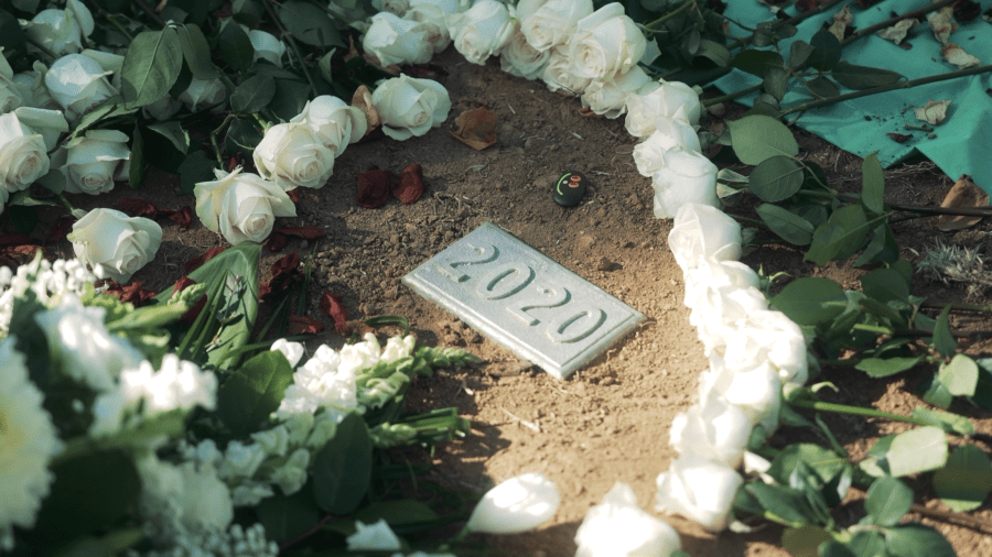 A 2020 headstone marks the communal grave where the remains of 1,900 people were laid to rest during L.A. County annual Ceremony of the Unclaimed Dead on Dec. 14, 2023. (Los Angeles County Department of Health Services)