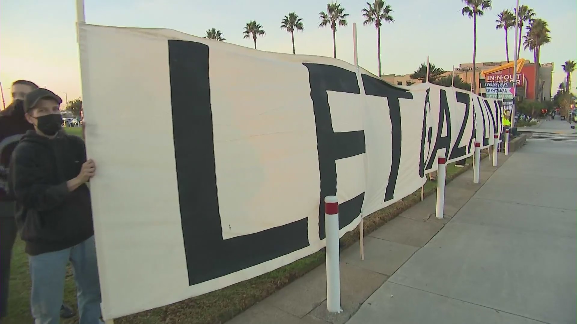 A group of protesters calling for a ceasefire in Gaza were blocking streets near the Los Angeles International Airport on Dec. 15, 2023. (KTLA)