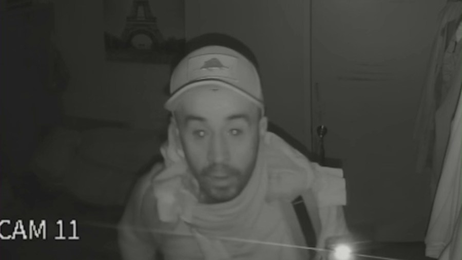 Security video captures the moment a burglar broke into a home and stole thousands of dollars worth of cash and jewelry in Westminster on Dec. 9, 2023. (Le Family)
