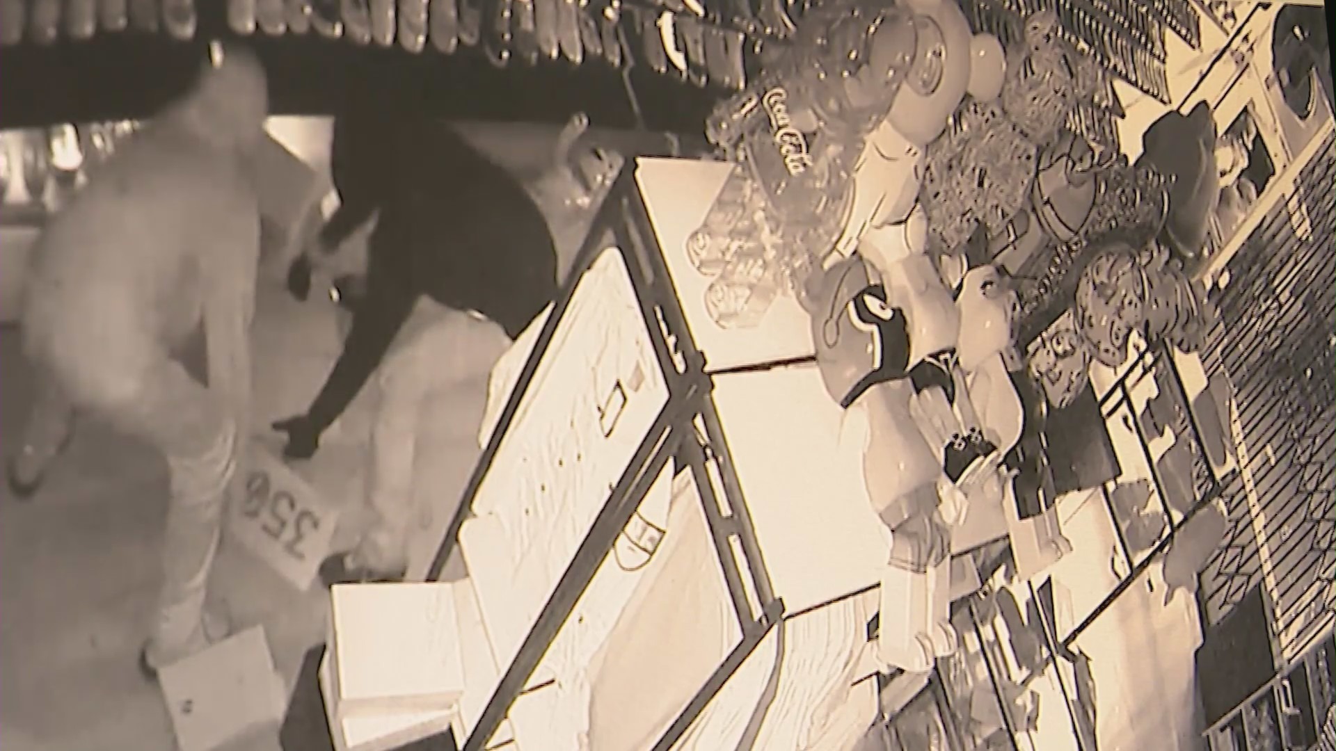 Surveillance video captured thieves breaking in and stealing from an Encino shoe store