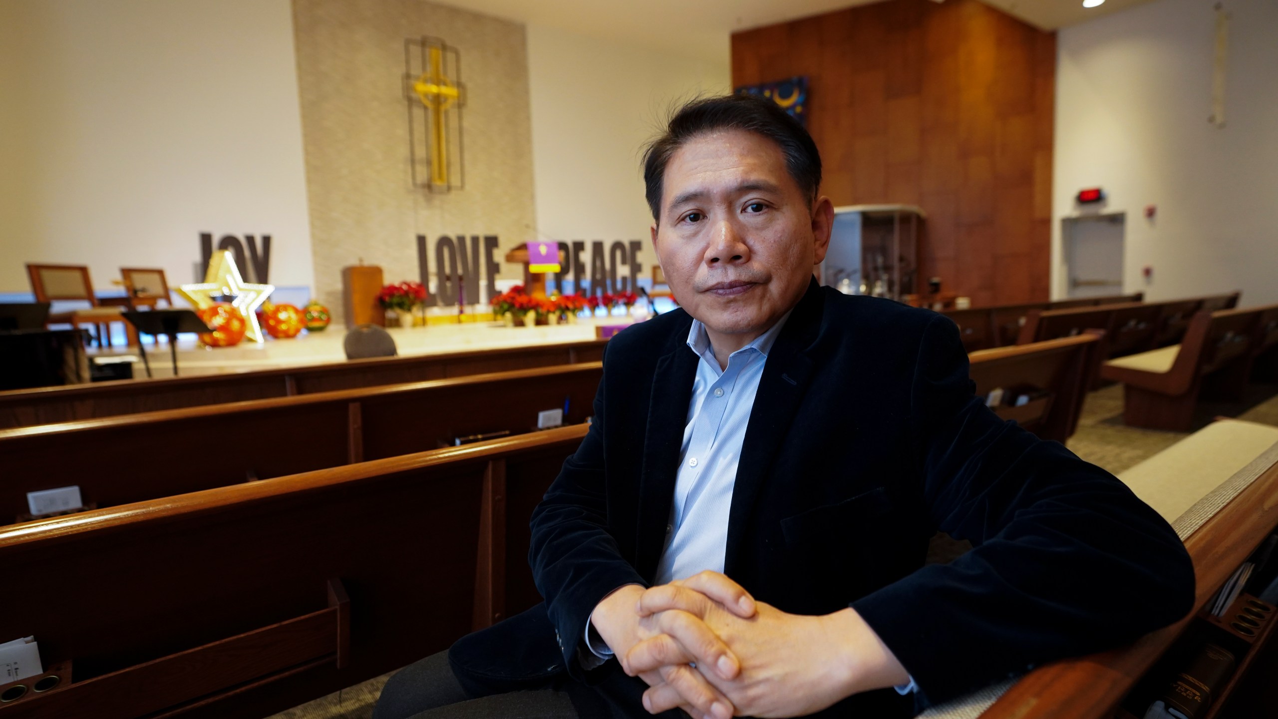 Rev. Byeong Cheol Han poses for a portrait at Korean Central Presbyterian Church of Atlanta Thursday, Dec. 21, 2023, in Chamblee, Ga. The slaying of a South Korean woman during an initiation process for a group that called itself Soldiers of Christ has shocked the large Korean American community in metro Atlanta. Community leaders say Korean Americans need to be more vigilant to protect against religious cults and the possible exploitation of new arrivals from South Korea. (AP Photo/John Bazemore)y