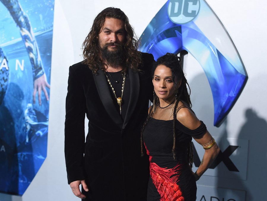 FILE - Jason Momoa, left, and Lisa Bonet, right, arrive at the premiere of "Aquaman" at TCL Chinese Theatre, Dec. 12, 2018, in Los Angeles. On Monday, Jan. 8, 2024, Bonet filed for divorce from Momoa, 18 years after the two actors became a couple. (Photo by Jordan Strauss/Invision/AP, File)