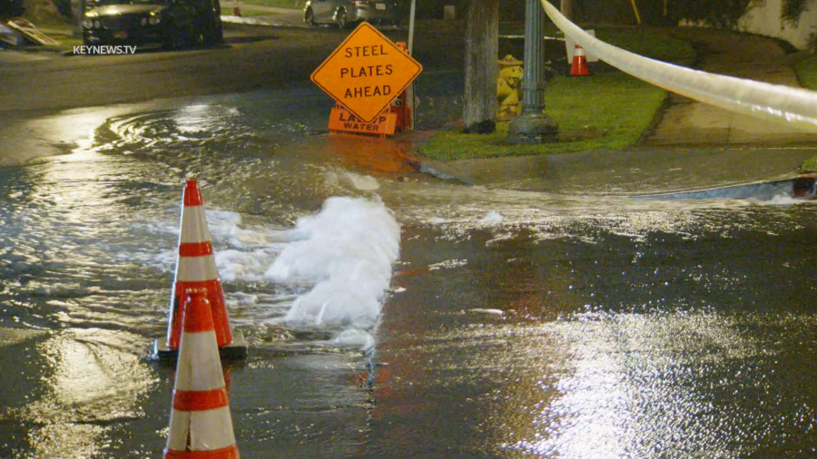 A broken main sent water gushing down a Westwood street on Jan. 15, 2024.