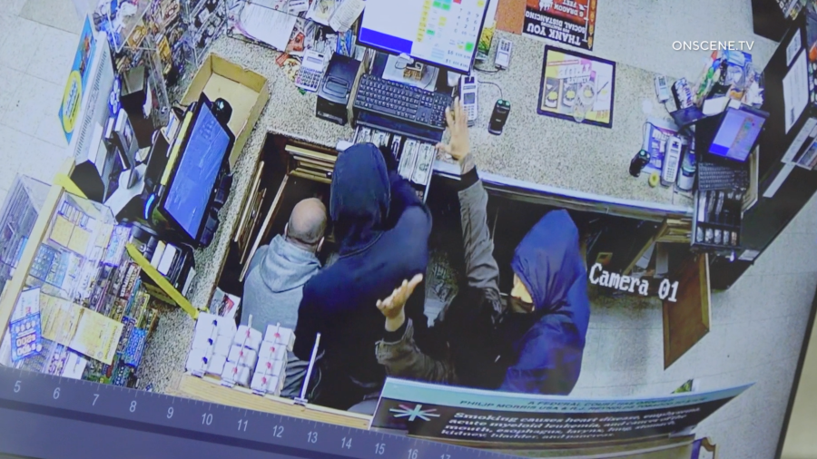 Two suspects are seen robbing a liquor store in Anaheim on Jan. 18, 2024.