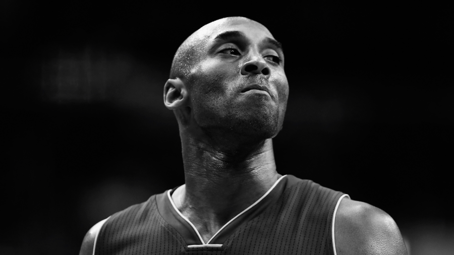 (Editors Note: Image has been converted to black and white) Kobe Bryant #24 of the Los Angeles Lakers looks on against the Washington Wizards in the first half at Verizon Center on December 2, 2015 in Washington, DC.