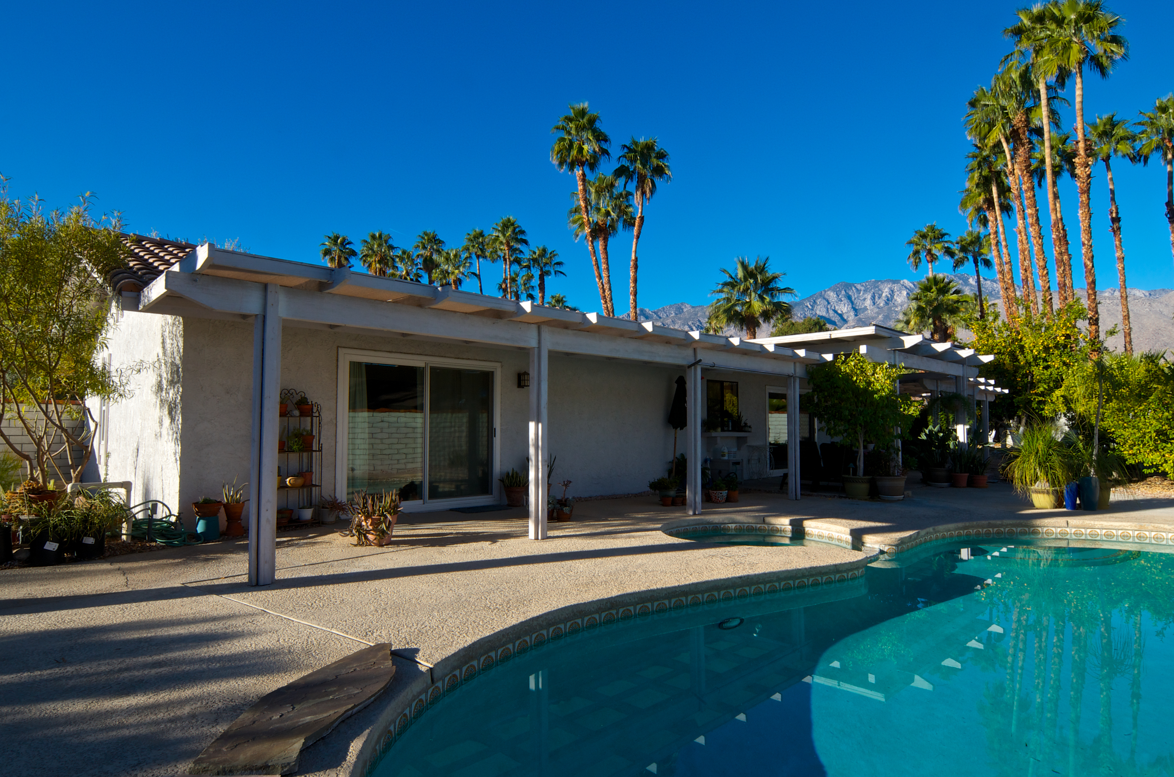 A morning scene in the backyard swimming pool and patio area of a private residence in the Sonoran Desert town of Palm Springs, California. (Getty Images)