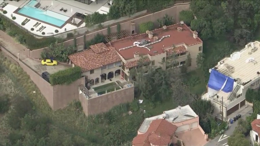 A Beverly Crest mansion taken over by squatters is surrounded by high-profile celebrity neighbors. (KTLA)