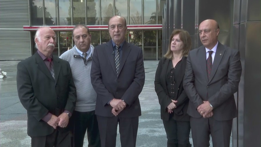 John Yaghoubi (third from left) and loved ones expressed their disappointment after a court ruling on Jan. 23, 2024. (KTLA)