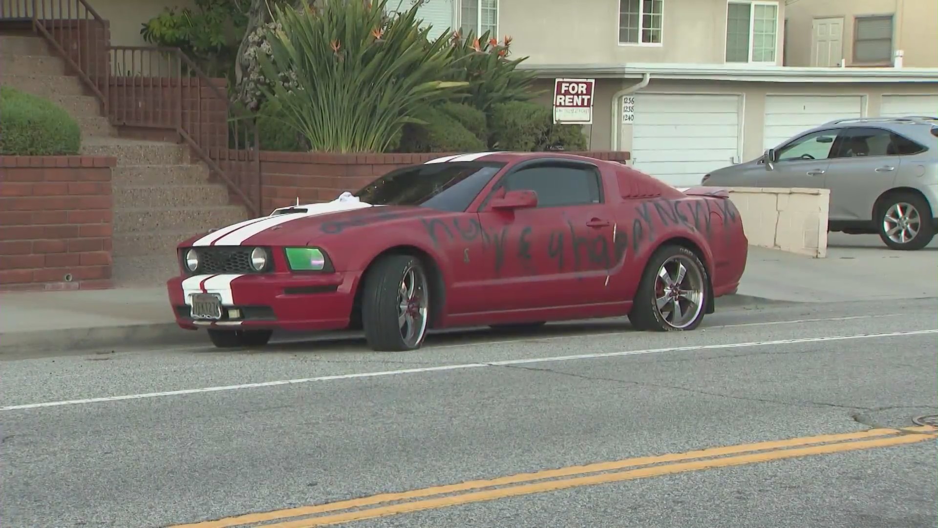 A San Pedro family remains shaken after they woke up to find their car was vandalized with a racial slur and a Swastika during the holidays. (KTLA)