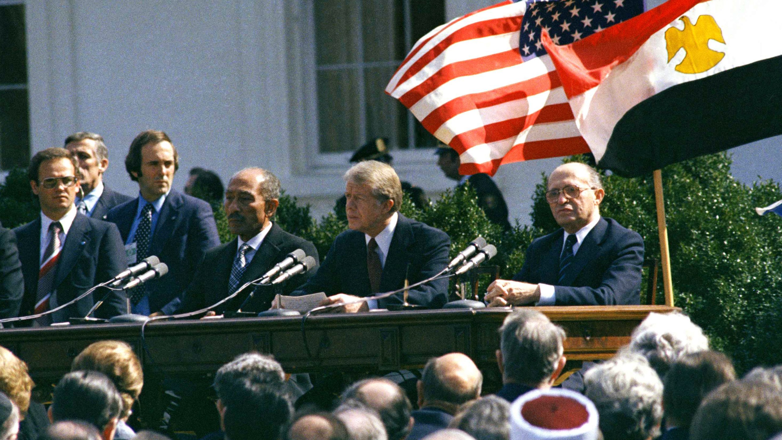 CORRECTS DATE FILE - U.S. President Jimmy Carter, Egyptian President Anwar Sadat and Israeli President Menachem Begin attend the formal ceremony for the Camp David Accords in Washington, D.C., March 26, 1979, designed to bring peace to the Middle East. Egypt has threatened to void its decades-long peace treaty with Israel if Israel begins a large-scale offensive on Rafah, where some 1.4 million Palestinians shelter in densely-packed tent camps on the border with Egypt. (AP Photo, File)