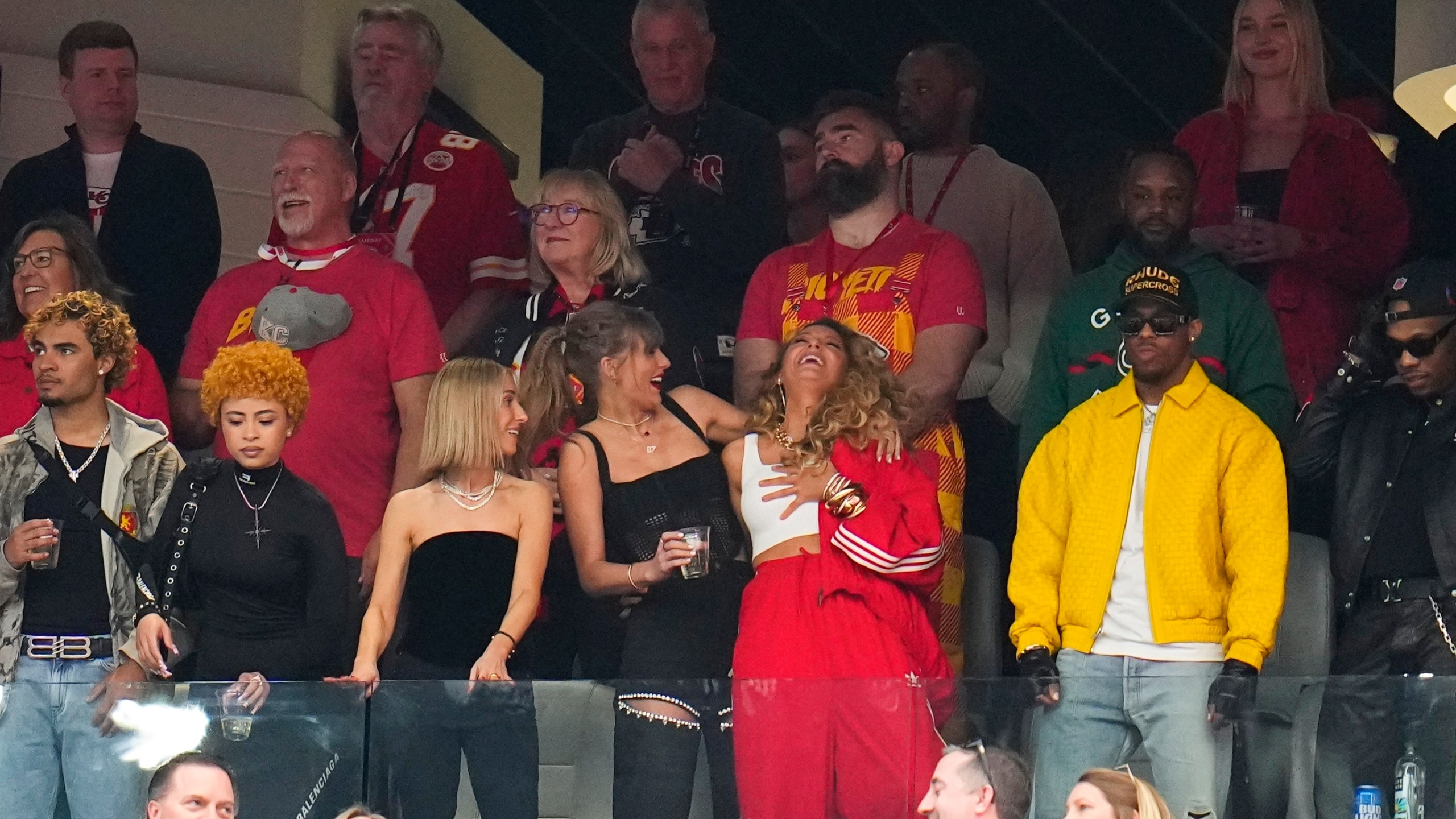 Taylor Swift, bottom left, and Blake Lively laugh before the NFL Super Bowl 58 football game between the San Francisco 49ers and the Kansas City Chiefs on Sunday, Feb. 11, 2024, in Las Vegas. (AP Photo/Julio Cortez)