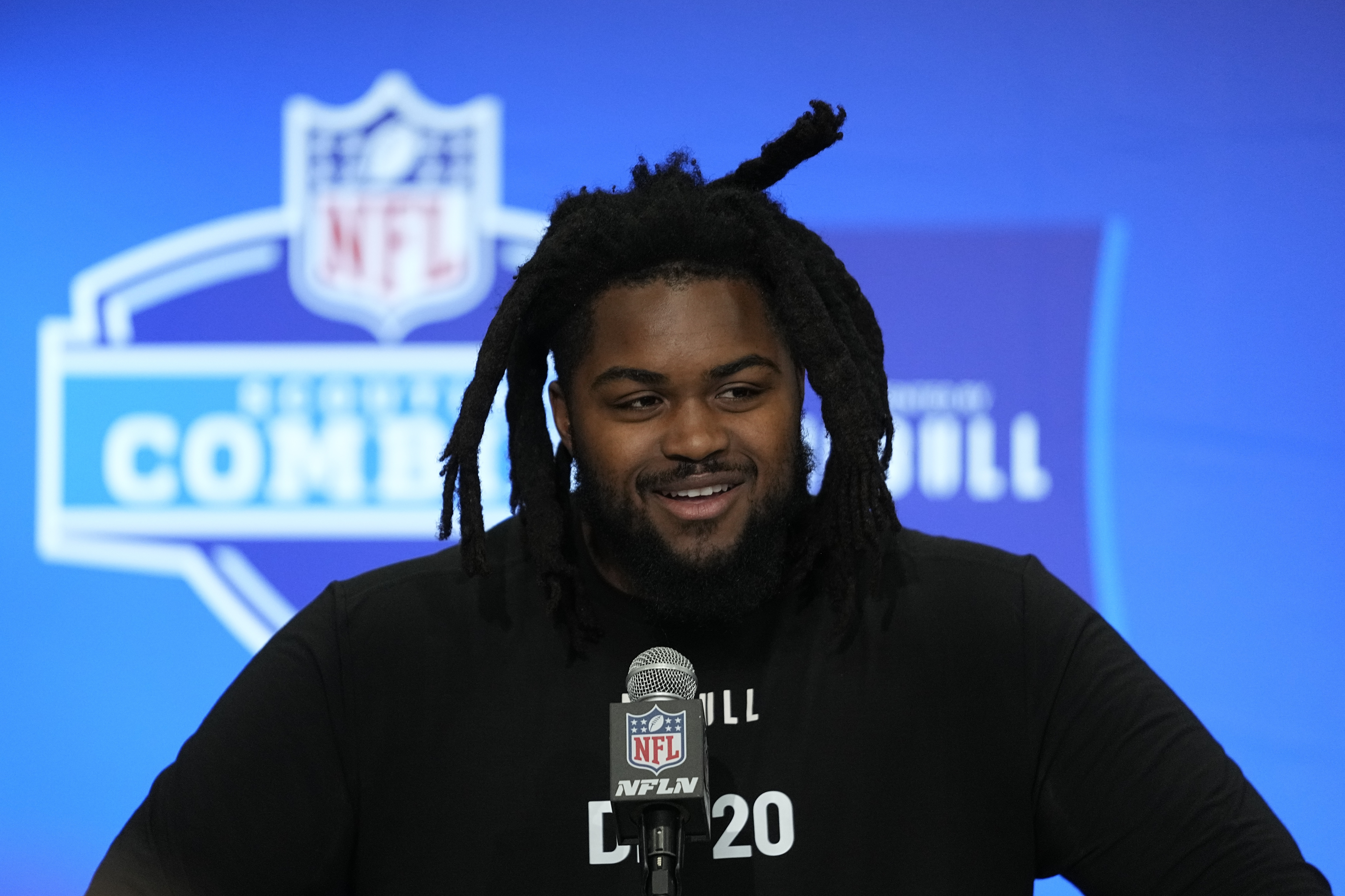 Illinois defensive lineman Johnny Newton speaks during a news conference at the NFL football scouting combine, Wednesday, Feb. 28, 2024, in Indianapolis. (AP Photo/Darron Cummings)