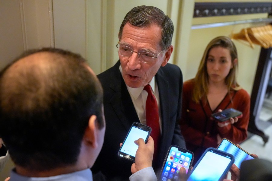 Sen. John Barrasso, R-Wyo., speaks with members of the media, Wednesday, Feb. 28, 2024, at the Capitol in Washington. Earlier Sen. Mitch McConnell announced that he'll step down as Senate Republican leader in November. (AP Photo/Mark Schiefelbein)