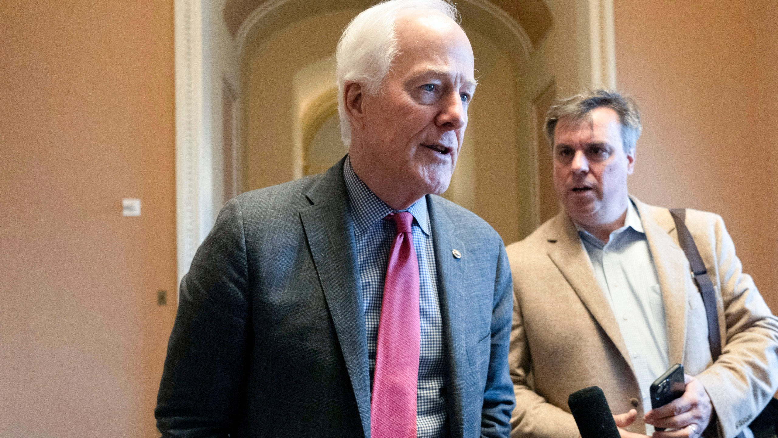 FILE - Sen. John Cornyn, R-Texas, speaks to reporters, Feb. 28, 2024, shortly before Senate Minority Leader Mitch McConnell of Ky., announced he will step down as Senate Republican leader in November, at the Capitol in Washington. Cornyn has informed his colleagues that he intends to run for Senate Republican leader. He's the first senator to announce a campaign. (AP Photo/Jacquelyn Martin, File)