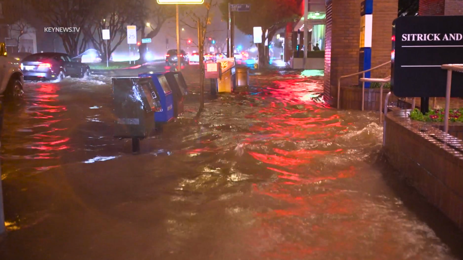 Water floods sidewalks in Brentwood on Feb. 4, 2024.