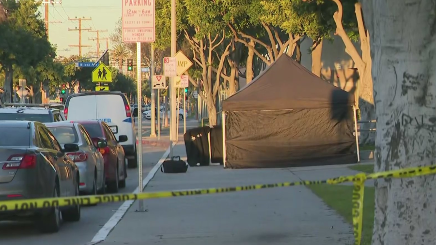 A canopy is seen during a a fatal shooting investigation outside the Ellen Ochoa Learning Center in Cudahy on Feb. 12, 2024.