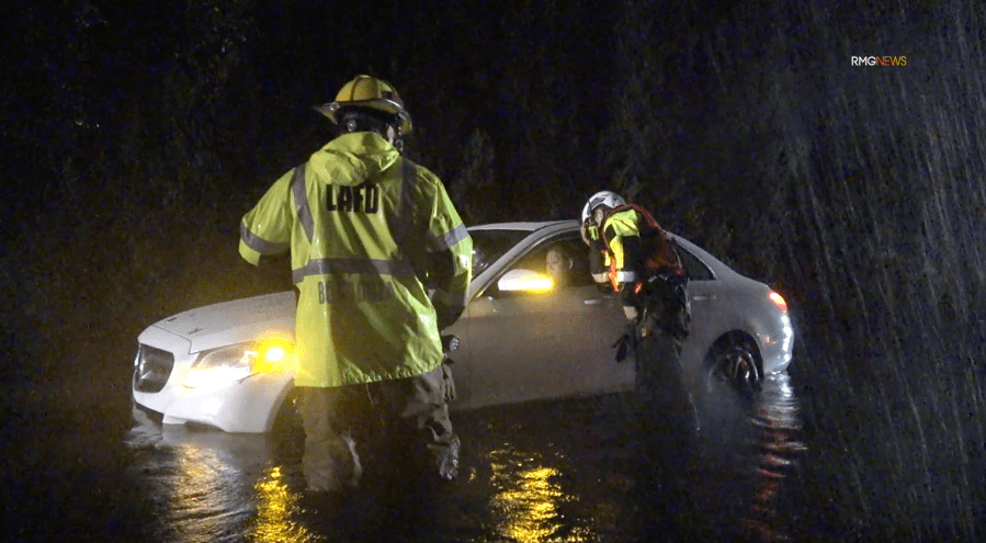 Motorists stranded in flood waters in Tarzana