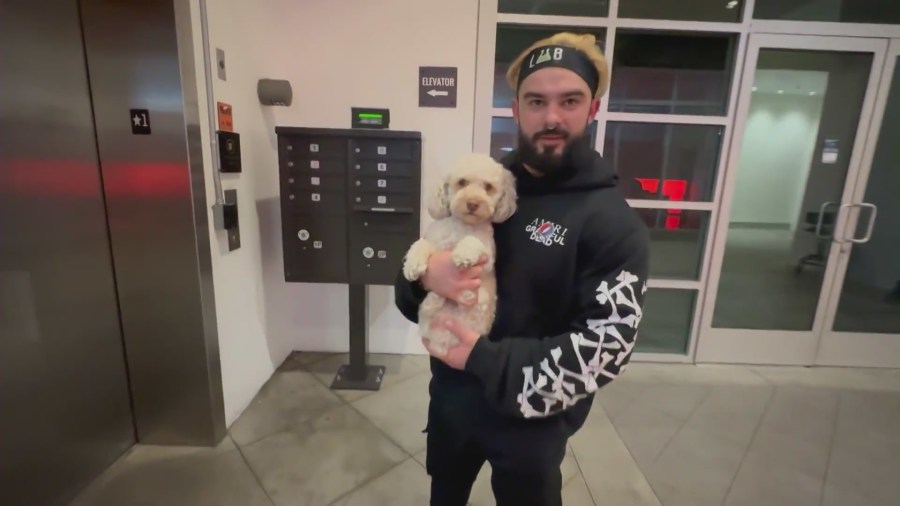 Rocco DiStefano, 29, and his 4-year-old dog, Hercules in West Hollywood on Feb. 28, 2024. (KTLA)