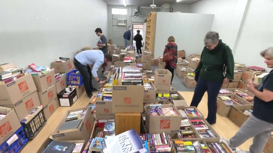 Customers shop a closeout sale at The Book Rack in Arcadia on Feb. 27, 2024. (KTLA)