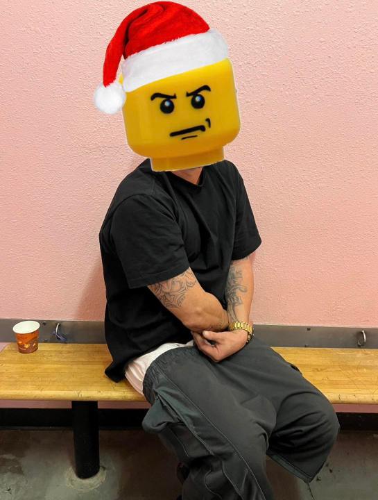 A suspect is shown with a Lego head covering their face. 