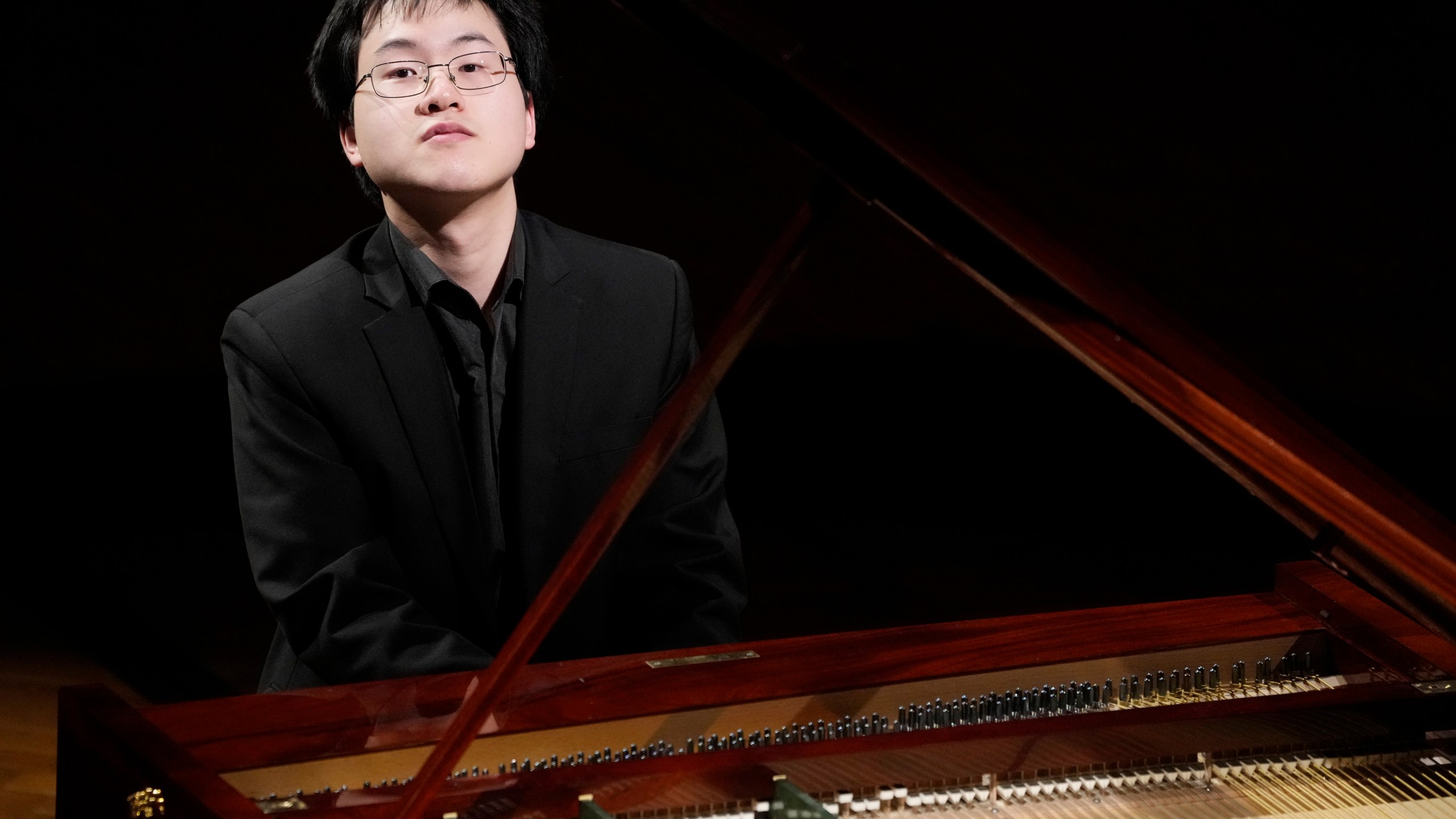 Canadian pianist Eric Guo plays Frederic Chopin's Concerto in F minor on a replica of a 1830 Pleyel piano during a concert marking the 19th century piano virutoso and composer's 214th birthday, in Warsaw, Poland, on Friday, March 1, 2024. Guo won a quintannual competition to play Chopin on period instruments organized by the Fryderyk Chopin Institute. (AP Photo/Czarek Sokolowski)