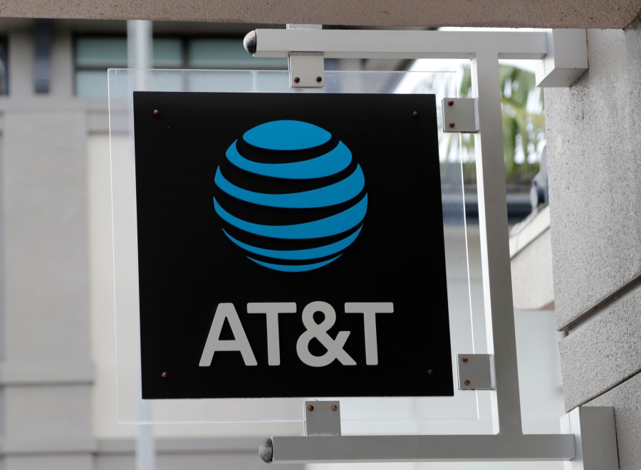 FILE - The sign in front of an AT&T retail store is seen in Miami, July 18, 2019. The theft of sensitive information belonging to millions of AT&T’s current and former customers has been recently discovered online, the telecommunications giant said Saturday, March 30, 2024. In an announcement addressing the data breach, AT&T said that a dataset found on the dark web contains information including some Social Security numbers and passcodes for about 7.6 million current account holders and 65.4 million former account holders. (AP Photo/Lynne Sladky, File)