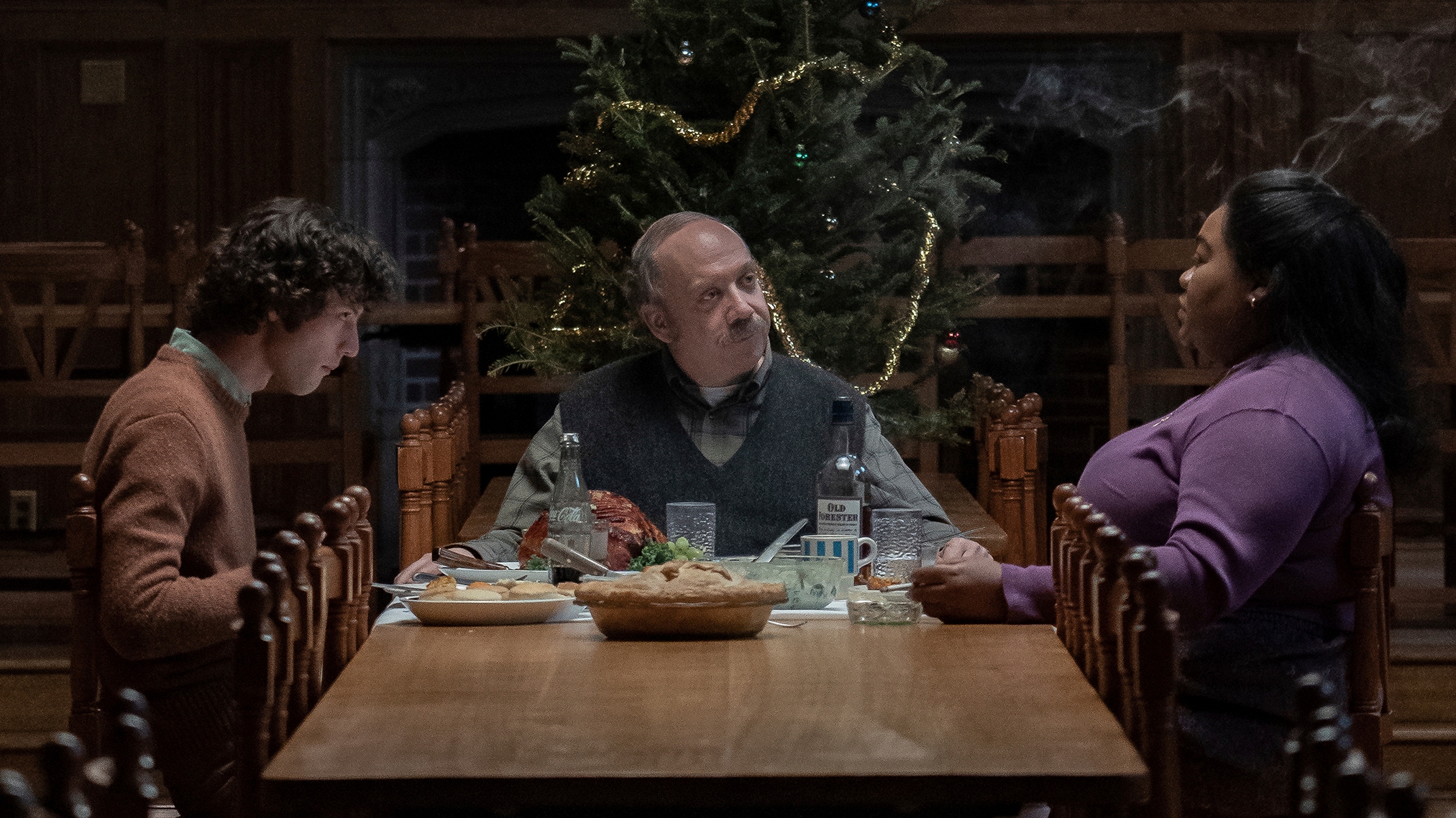 This image released by Focus Features shows Dominic Sessa, from left, Paul Giamatti and Da'Vine Joy Randolph in a scene from "The Holdovers." (Seacia Pavao/Focus Features via AP)